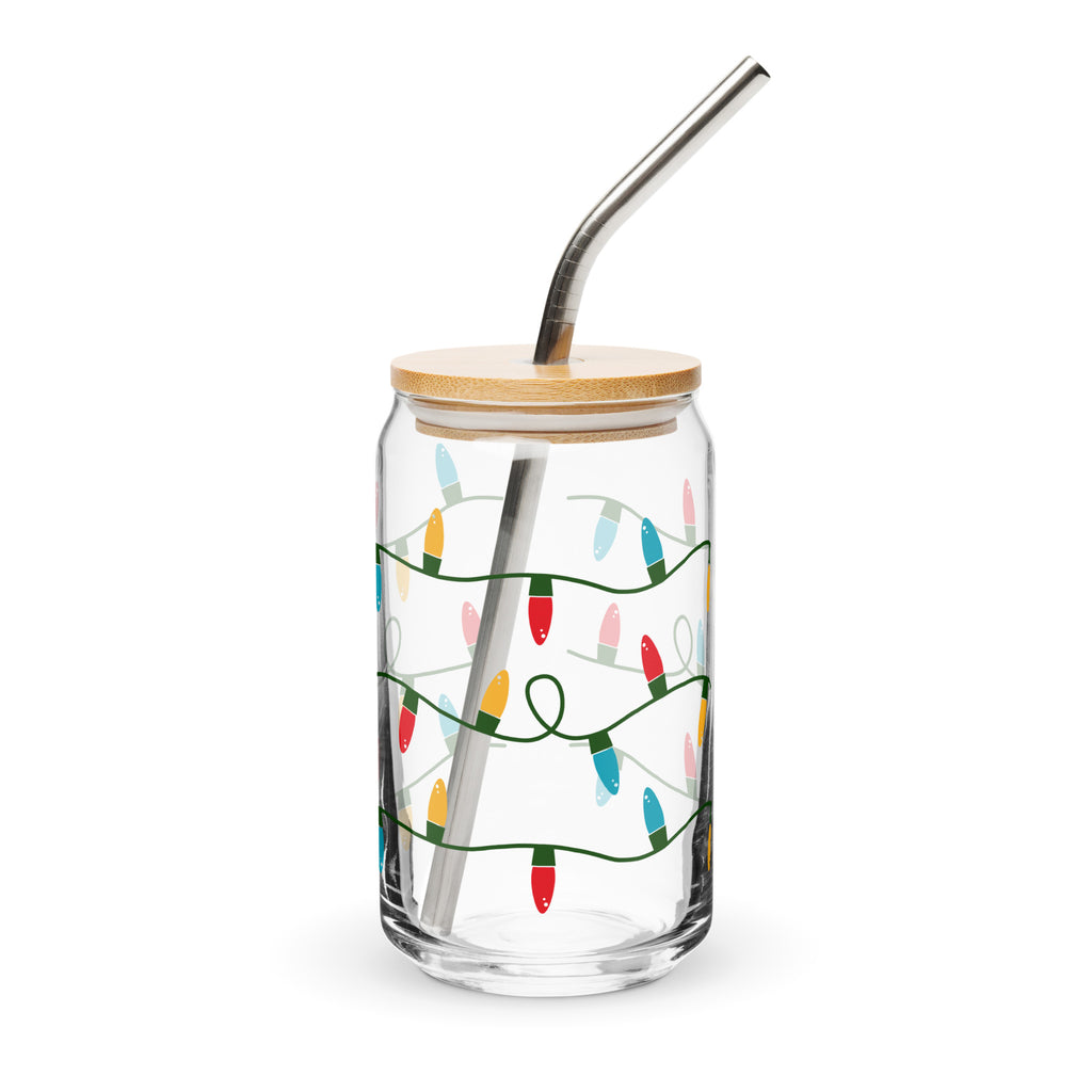 Clear glass tumbler with bamboo lid and metal straw featuring Christmas light design on a white background