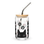 Clear tumbler with bamboo lid and metal straw featuring black cat and paw prints design on a white background.