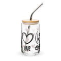 Glass tumbler with bamboo lid and metal straw, featuring heart and paw designs on a white background.