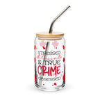 Glass tumbler with straw and wooden lid featuring text and heart designs on a white background