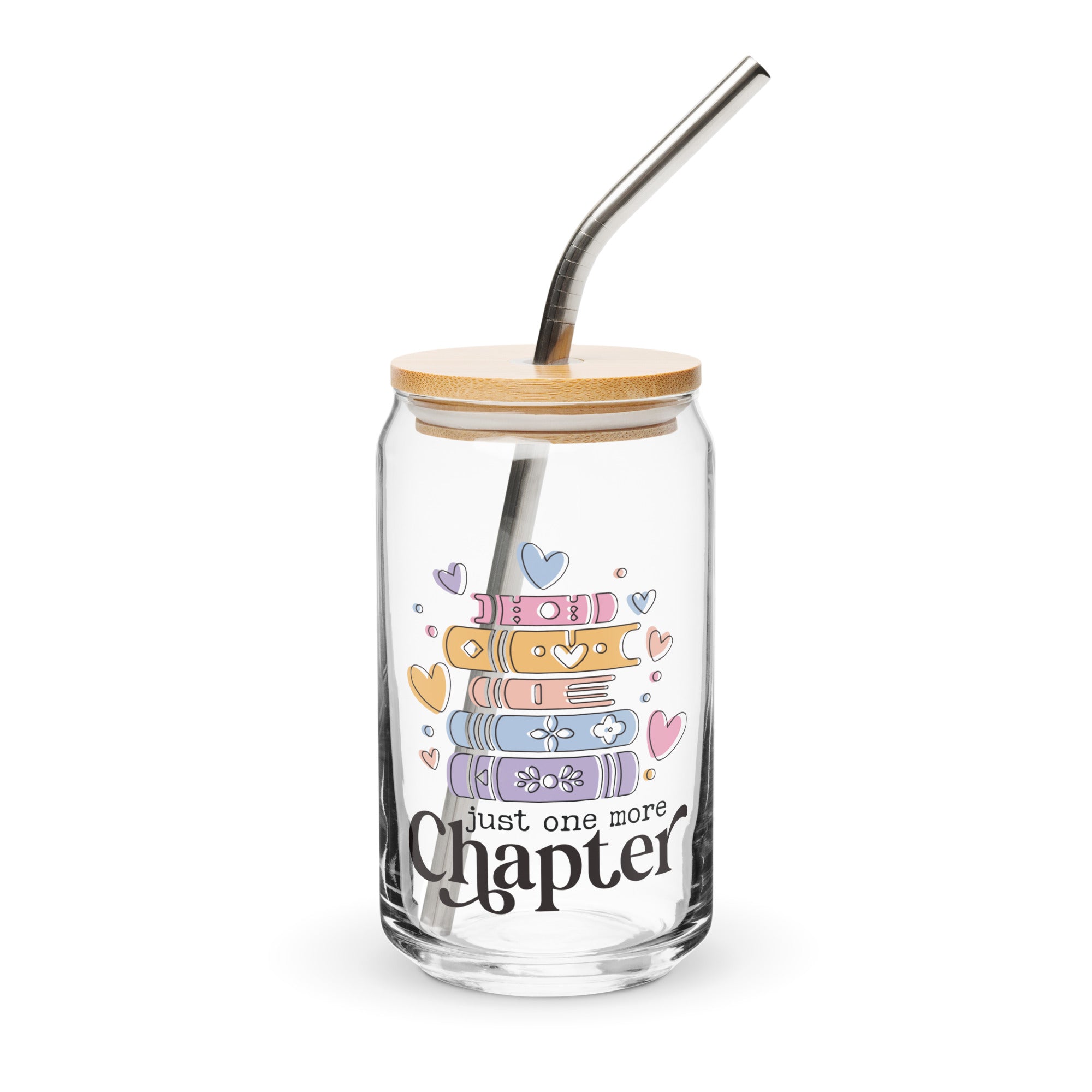 Glass tumbler with bamboo lid and metal straw, featuring colorful book illustrations and 'just one more chapter' text.