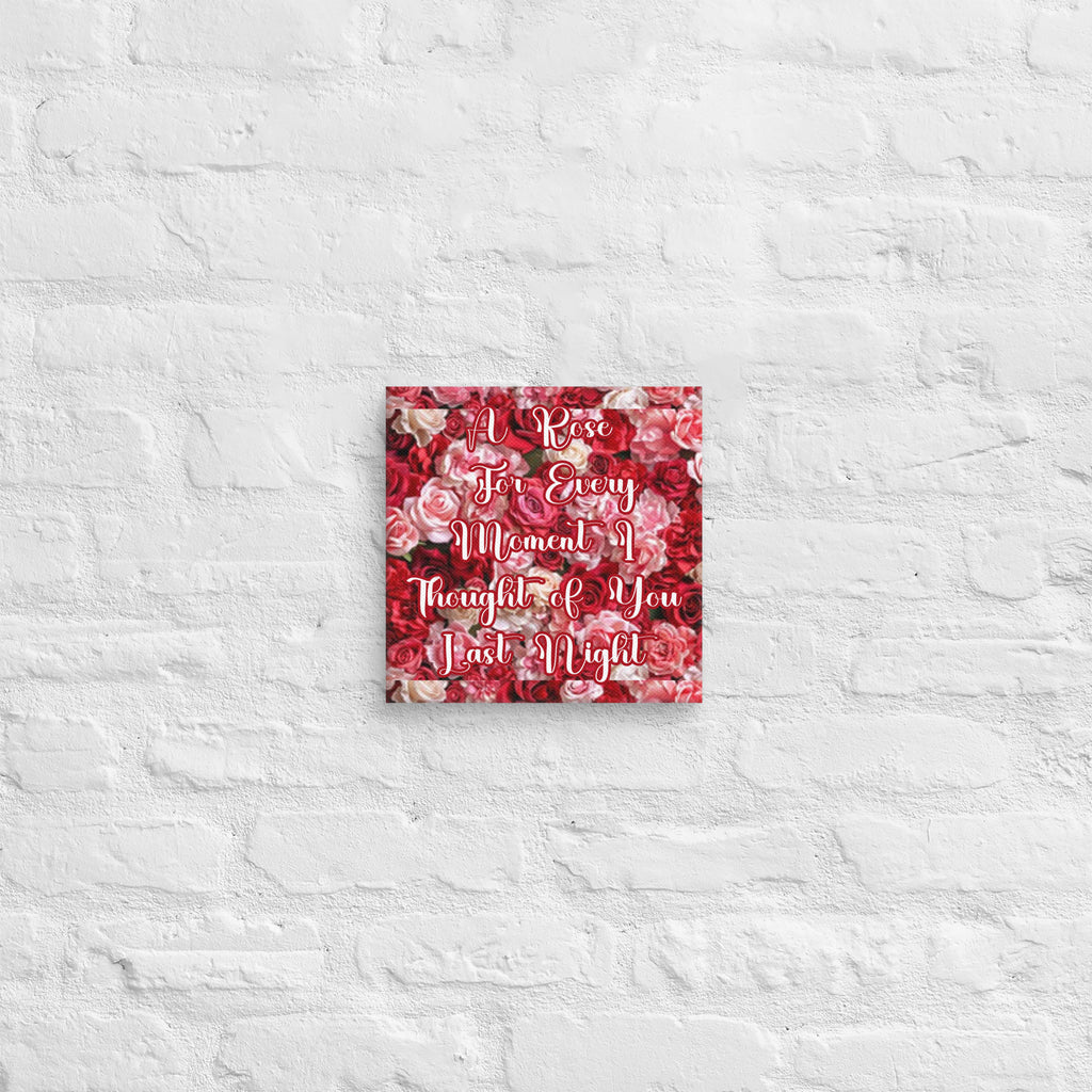Decorative wall art with floral pattern and text on a textured white wall.