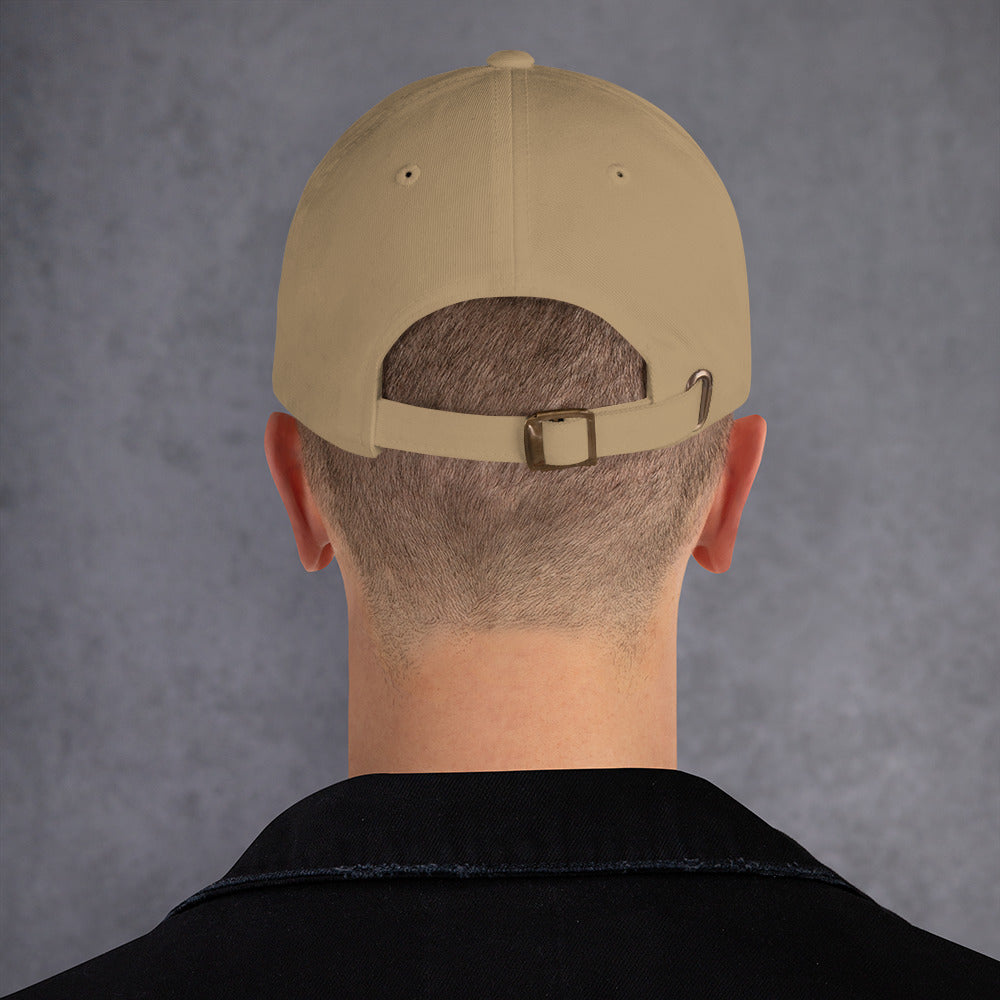 Beige cap back on a person with a gray background