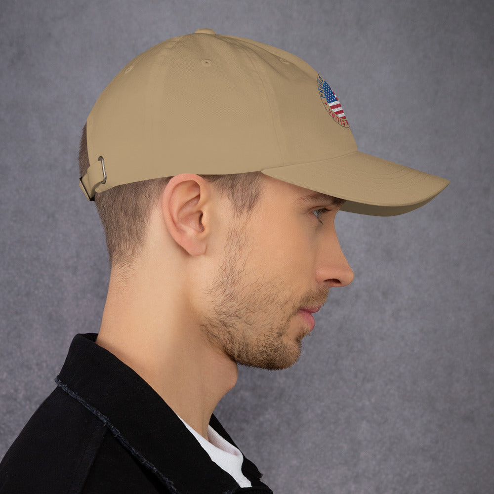 Man wearing a beige cap against a gray background