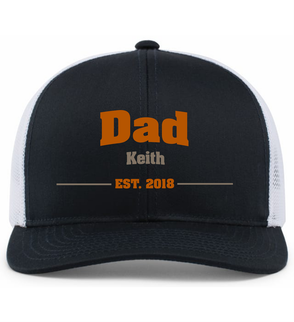 Black and white cap with 'Dad Keith EST. 2018' text on a white background