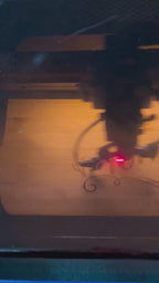 Video of a cutting board getting laser engraved