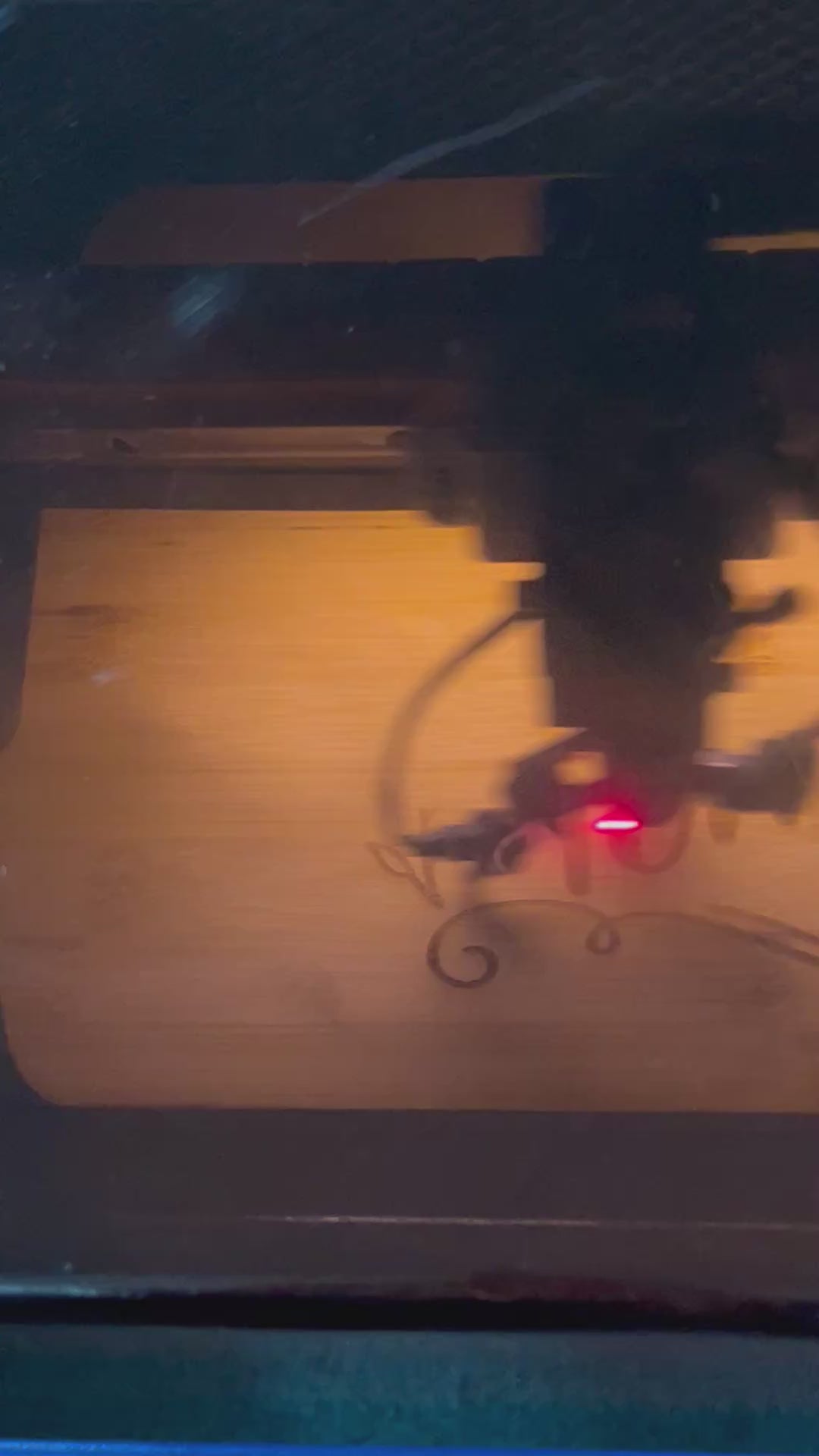 Video of a cutting board getting laser engraved