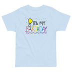 Light blue t-shirt with 'It's My Birthday' text and balloon design on a white background