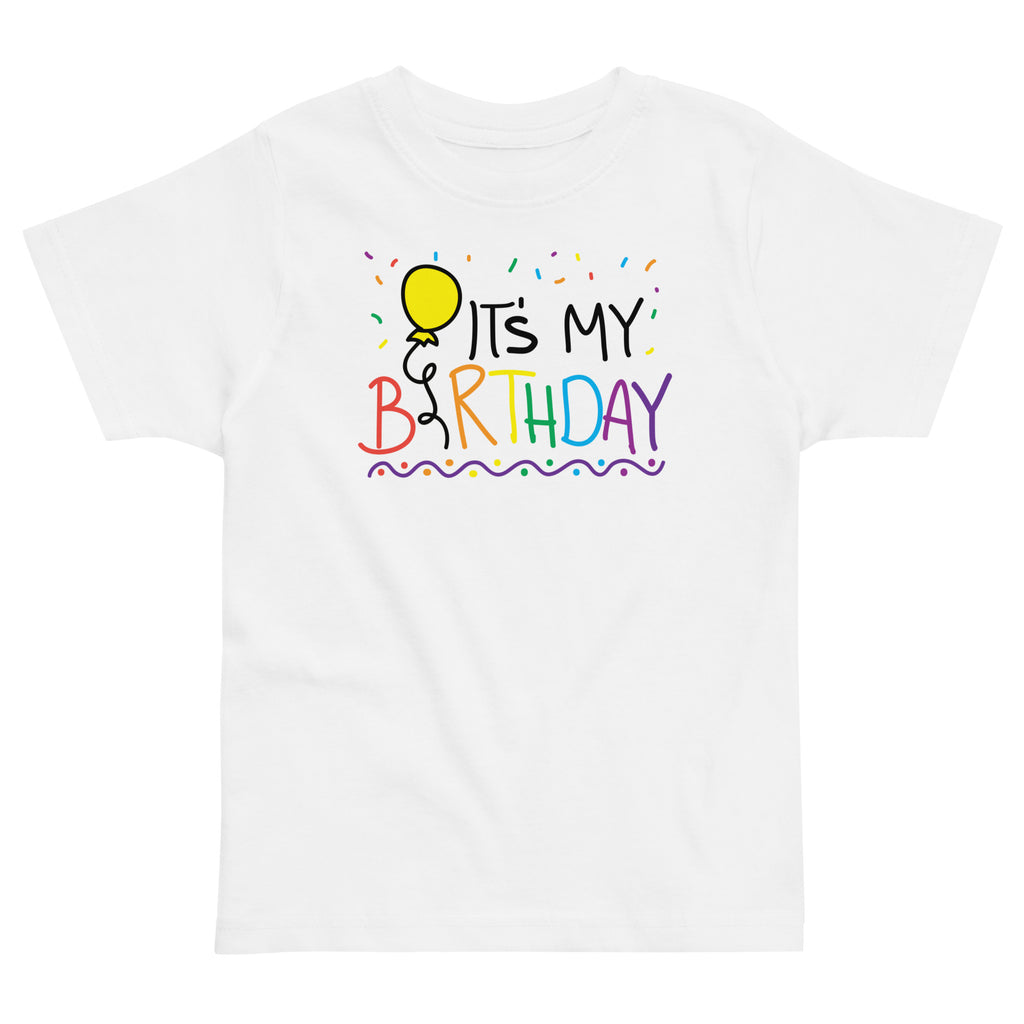 White t-shirt with 'It's My Birthday' text and balloon design on a white background