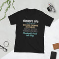 Black t-shirt with colorful Theatre Life This means we do odd things in public hang with weird people randomly break into song text on a light gray surface with a camera and glasses.