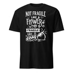 Black t-shirt with white Not Fragile Like A Flower Fragile Like A Bomb text and graphic on a white background