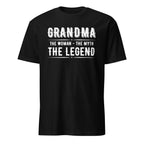 Black t-shirt with white text 'GRANDMA THE WOMAN THE MYTH THE LEGEND' on a white background