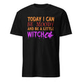A black short-sleeve crewneck t-shirt with a colorful graphic on the chest that reads 'TODAY I CAN BE MOODY AND BE A LITTLE WITCH' in orange, red, and purple dripping fonts, alongside a purple witch silhouette.