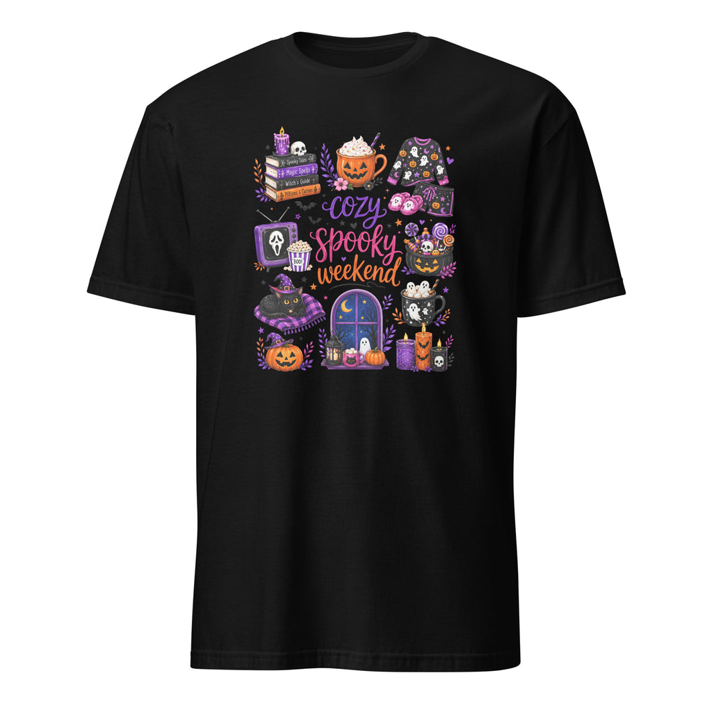 A black short-sleeve crewneck t-shirt featuring a colorful 'Cozy Spooky Weekend' graphic print on the front, displayed against a solid white background.