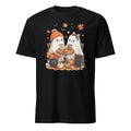 A black short-sleeve crewneck t-shirt featuring a colorful graphic print of two cute cartoon ghosts sitting at a small autumn-themed table with pumpkins, leaves, and bats.