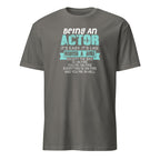 Charcoal t-shirt with humorous actor quote, Being An Actor It's Easy, It's Like Riding A Bike Except The Bike Is On Fire You're On Fire Everything Is On Fire And you're In Hell on a white background