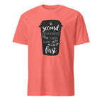 Coral t-shirt with a black coffee cup graphic and text on a white background