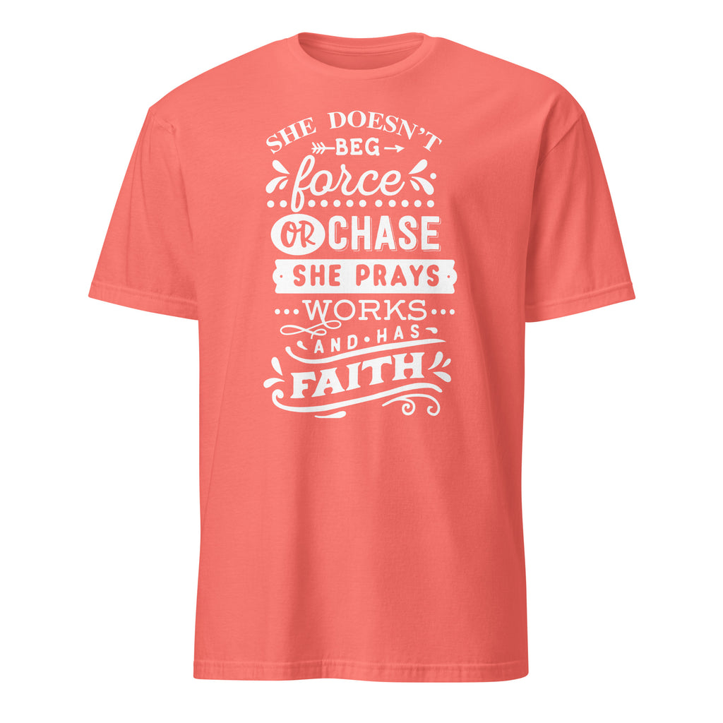 Coral t-shirt with white motivational text design on a white background
