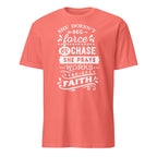 Coral t-shirt with white motivational text design on a white background
