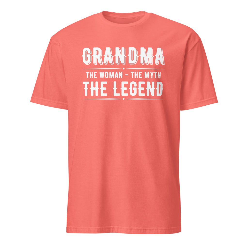 Coral t-shirt with white text 'GRANDMA THE WOMAN THE MYTH THE LEGEND' on a white background