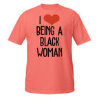 Coral t-shirt with 'I ❤️ BEING A BLACK WOMAN' text on a white background