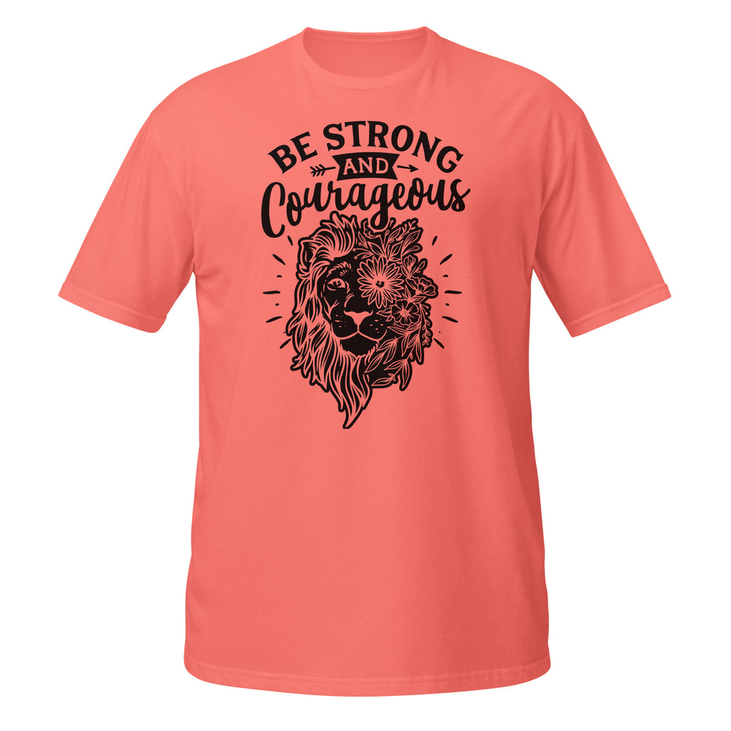 Coral t-shirt with black lion graphic and 'Be Strong and Courageous' text on a white background