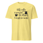 Yellow t-shirt with "I Like Coffee Because It Gives Me The Illusion I Might Be Awake" text design on a white background