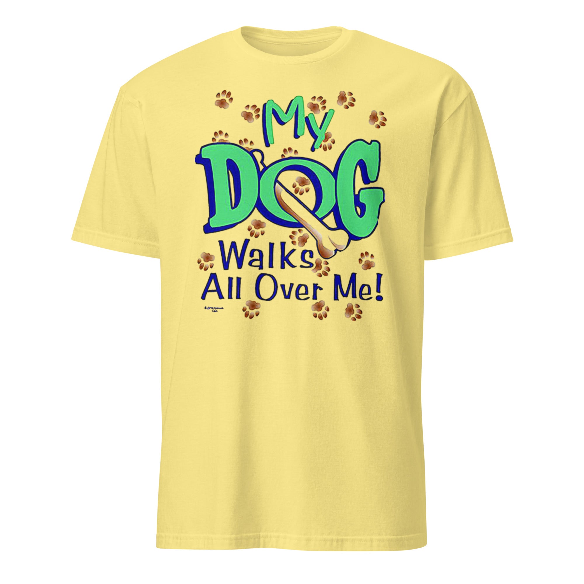 Yellow t-shirt with 'My Dog Walks All Over Me!' text and paw prints on a white background