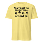 Yellow t-shirt with black text and paw prints on a white background