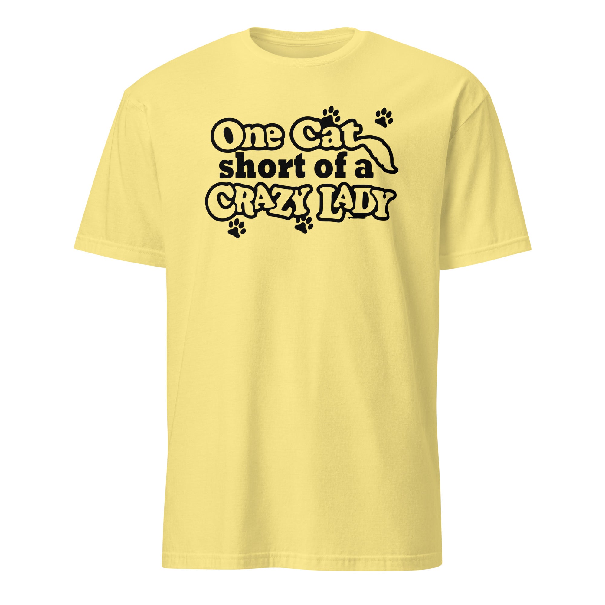 Yellow t-shirt with black text 'One cat short of a crazy lady' on a white background