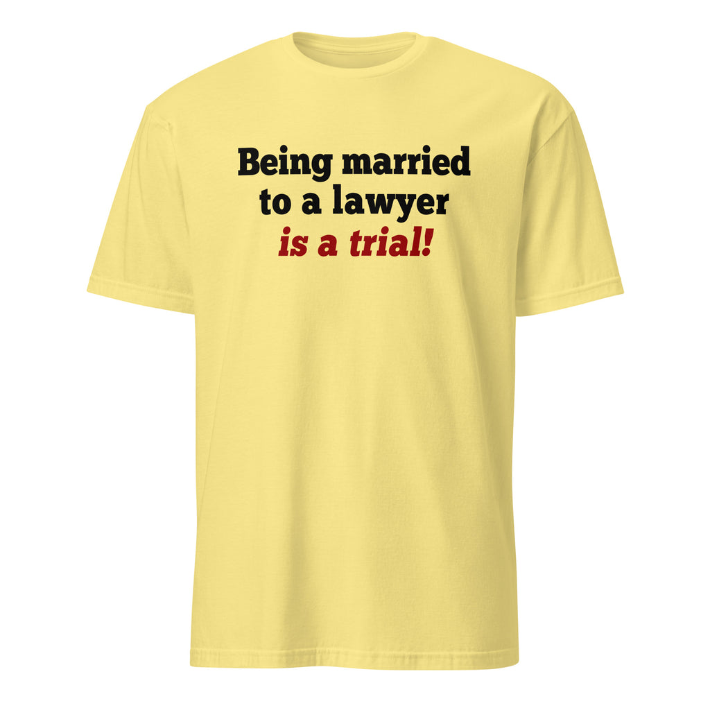 Yellow t-shirt with text 'Being married to a lawyer is a trial!' on a white background