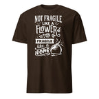 Brown t-shirt with white Not Fragile Like A Flower Fragile Like A Bomb text and graphic on a white background