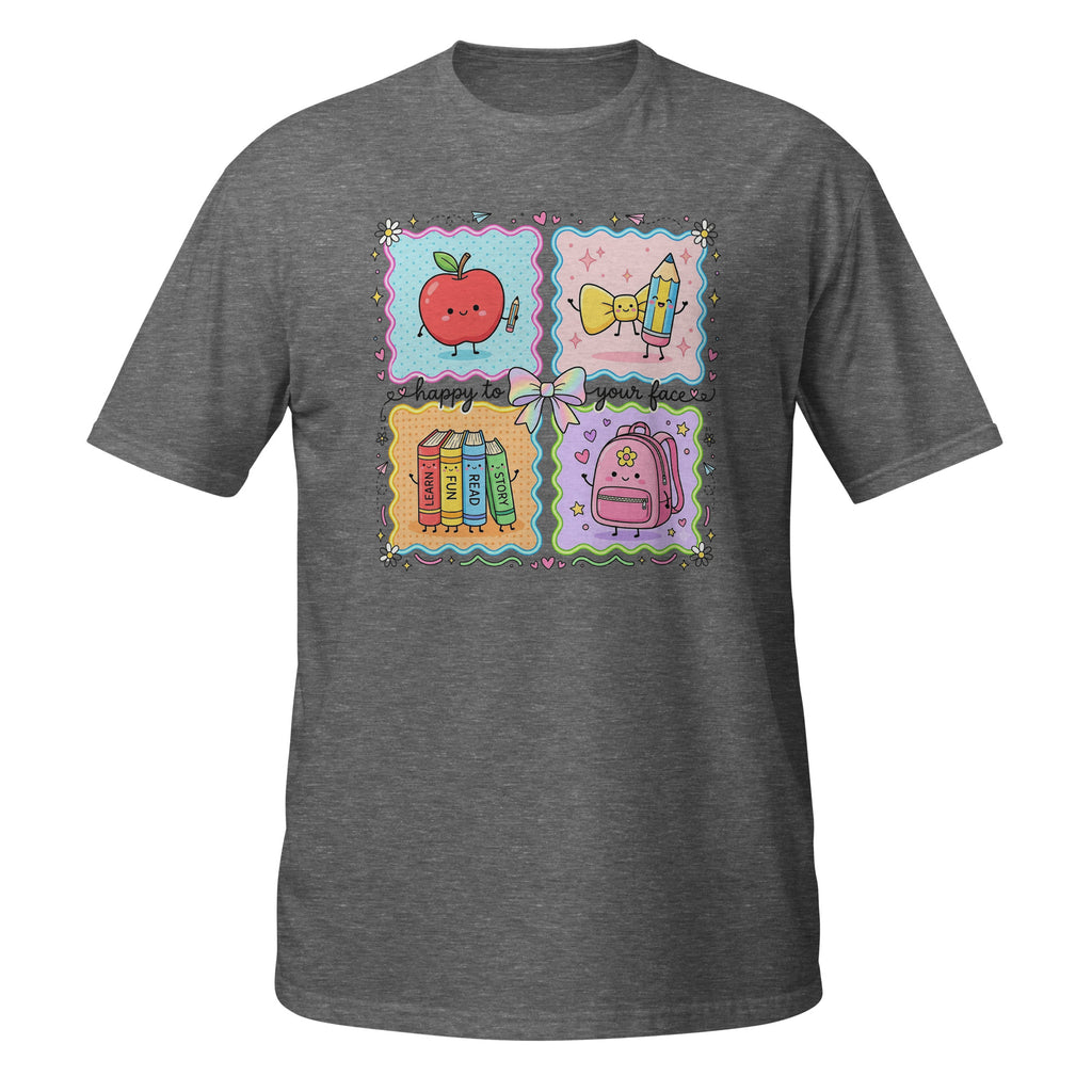 A dark heather gray short-sleeve t-shirt with a colorful graphic print on the chest. The graphic is divided into four square panels: a red apple holding a pencil, a yellow bow tie, books, and a pink backpack, all decorated with pastel borders.