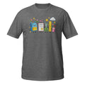 A dark heather gray short-sleeve t-shirt with a colorful cartoon graphic of school supplies (a blue backpack, a notebook, scissors, a ruler, and a pencil case) on the chest, displayed against a solid white background.