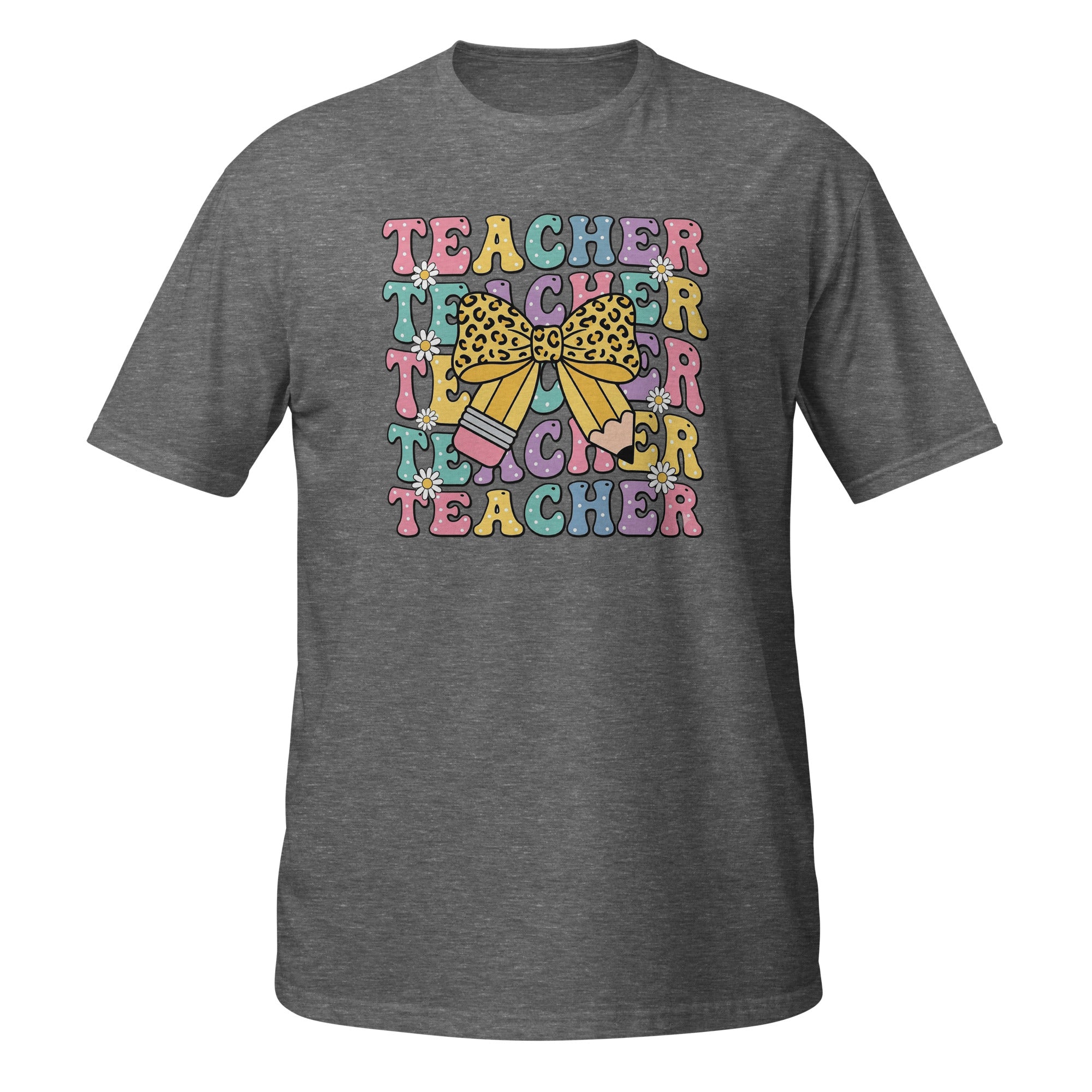 A heather gray short-sleeve t-shirt with a colorful retro graphic on the chest that reads 'TEACHER' repeated in pastel letters, overlaid with a yellow leopard-print bow and small pink and blue pencil illustrations, shown on a plain white background.