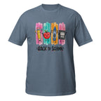 A slate blue short-sleeve t-shirt with a colorful 'Back to School' graphic on the chest, featuring cartoon drawings of a pencil, crayon, apple, and book on vertical paint strokes.