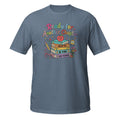 Blue t-shirt with 'Progress Over Perfection' graphic design on a white background