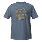 Blue t-shirt with 'Progress Over Perfection' graphic design on a white background