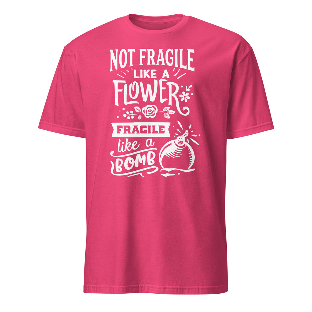 Pink t-shirt with white Not Fragile Like A Flower Fragile Like A Bomb text and graphic on a white background