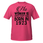Pink t-shirt with No Woman Is Perfect Except Those Born In 1973 text on a white background