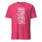 Pink t-shirt with motivational quote on a white background