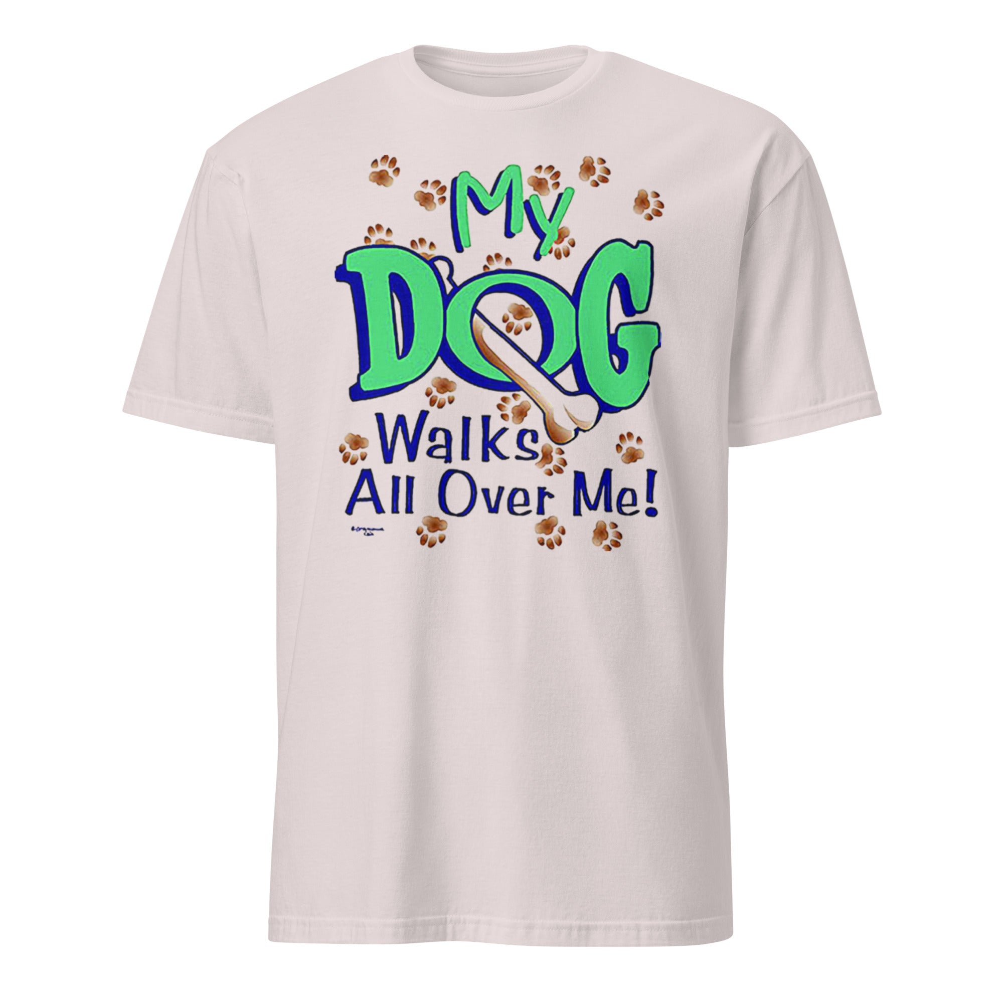 White t-shirt with 'My Dog Walks All Over Me!' text and paw prints on a white background