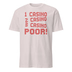 White t-shirt with red text '1 CASINO 2 CASINO 3 CASINO POOR!' on a white background