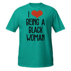 Teal t-shirt with 'I ❤️ BEING A BLACK WOMAN' text on a white background