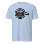 Light blue t-shirt with a black coffee cup graphic and text on a white background