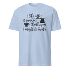 Light Blue t-shirt with "I Like Coffee Because It Gives Me The Illusion I Might Be Awake" text design on a white background