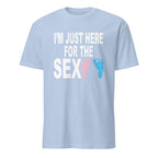 Light Blue unisex t-shirt with bold black text reading "I'm Just Here for the Sex" displayed flat-lay, styled for a gender reveal party theme with pink and blue accents in the background