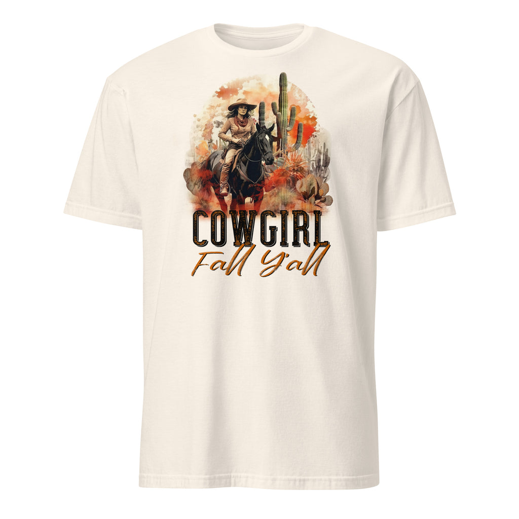 Natural t-shirt with a graphic of a cowgirl and cactus, and the text 'Cowgirl Fall Yall' on a white background.