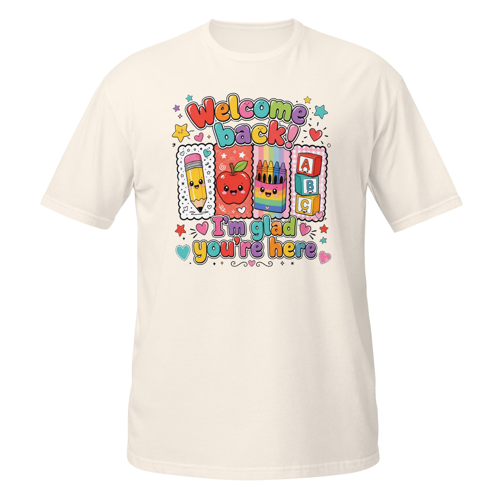 An off-white short-sleeve crewneck t-shirt featuring a colorful 'Welcome Back' and 'I'm glad you're here' school-themed graphic print on the front.