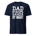 Navy blue t-shirt with white text 'Dad by day, Gamer by night' on a white background